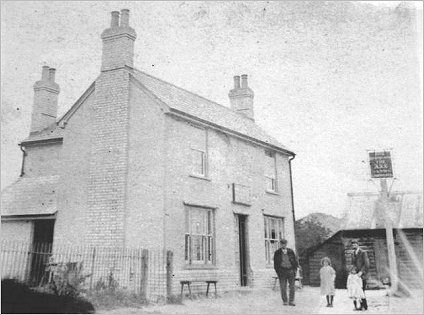 The 'Axe & Compasses' Public House rebuilt after the 1915 fire