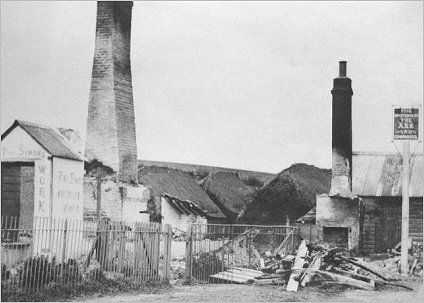 The 'Axe & Compasses' Public House destroyed by fire in 1915