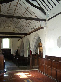 Interior looking west - the wagon ceiling replaced the collapsing post mediaeval plasterwork (with leadshot in the rafters) in 2005. Interior looking west - the wagon ceiling replaced the collapsing post mediaeval plasterwork (with leadshot in the rafters) in 2005.