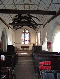 The Nave looking east towards the Chancel.